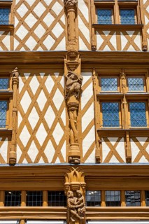 Magnificent medieval half-timbered art at the famous Maison d'Adam with artfully carved wooden