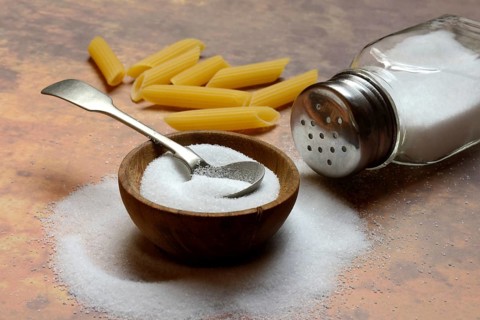 Salt in bowl and salt shaker, table salt and pasta, pasta