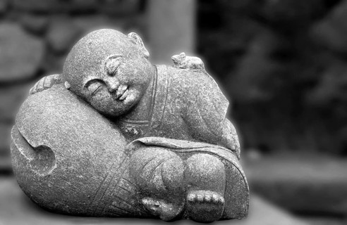 Smiling Buddha statue in Madeira, Portugal