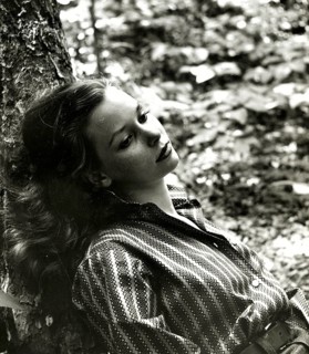Dreamy, dream, memory, longing, melancholy, sadness, youth, thoughtful woman leaning against a tree