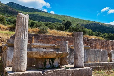 Arsinoe Fountain, Ancient Ruin Structure with Columns in Front of a Green Hill, Ancient Site,