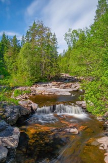 View of a waterfall and the surrounding nature, Telemark, Norway