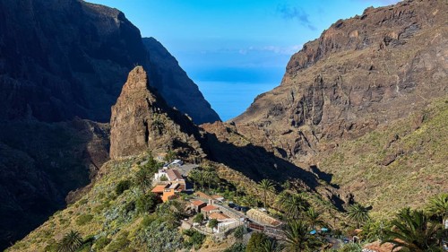 A small town nestled between steep mountain slopes with views of the deep gorges, Masca, Barranco