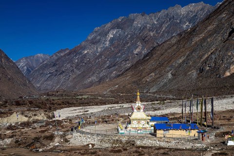 Buddhist stupa, including choirs with prayer flags, Tsum Valley, Himalayas, Nepal