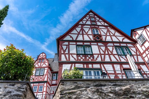 The Rhine near Spay, historic half-timbered houses right on the river, Rhineland-Palatinate,
