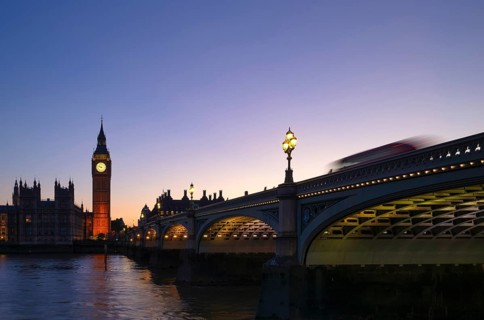 Night view, Thames, double-decker bus. Bus rides on Westminster Bridge, motion effect, long