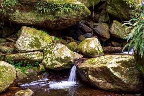 Small stream and waterfall among the rocks on Ilhabela Island off the coast of Sao Paulo, Ilhabela,