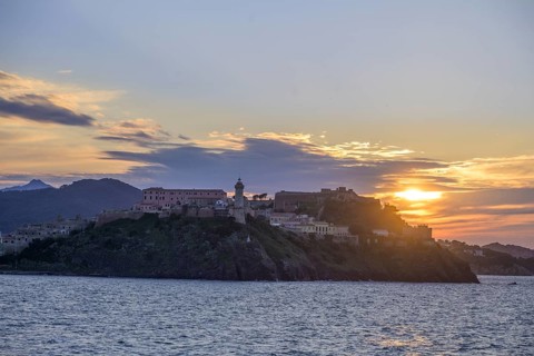 Harbour entrance in the evening at sunset, Portoferraio, Livorno Province, Italy