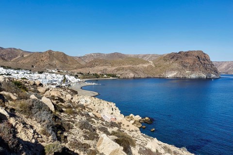 Rocky coast, arid volcanic landscape, white village, Cabo de Gata-Nijar nature park Park, Las