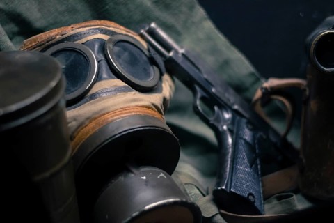 Laid pistol, mask and other accessories of WW2. Germany
