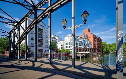 Könneritz Bridge, modern residential building with resatuarnt and renovated industrial building.