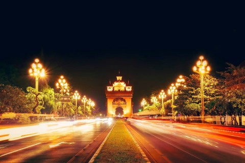 Vientiane, Laos - 15th february, 2025: Lane Xang Avenue and Patuxai Monument in Vientiane. Bright