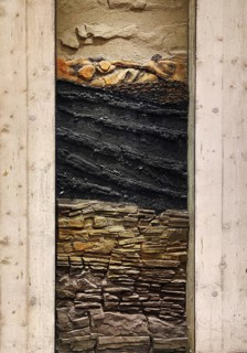 The original layers of soil behind a glass panel in the underground museum, art museum, Bochum,
