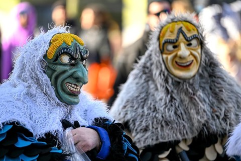 Members of a fools' guild in traditional Haes, fools' clothes, during the carnival procession in