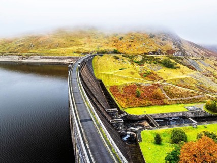 Autumn over Claerwen Dam, Claerwen Valley, Elan Valley Reservoir, Rhayader, Powys, Wales, UK