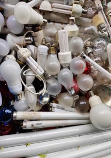 View of a full container with lots of broken lamps and lamps, Wertsoffzentrum Witten, Ruhr region,