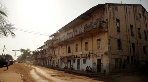 Old multi-storey building on a quiet street in Bissau, Guinea-Bissau