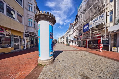 Advertising column, pedestrian zone, general architecture, commercial building, paving and paving