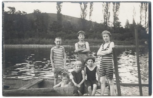 Bathing, swimwear, children, leisure, fun, summer, lake, boat, children in striped bathing suits on