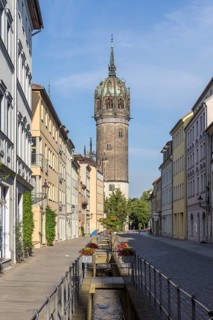 Coswiger Straße with Castle Church Tower, Luther city Wittenberg, Saxony-Anhalt, Germany