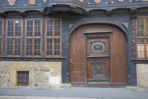 Gate with front door from Siemenshaus built 14th century, brown half-timbered house with