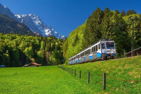 Bayerische Zugspitzbahn cogwheel railway with Zugspitze 2962m in spring, Grainau, Werdenfelser