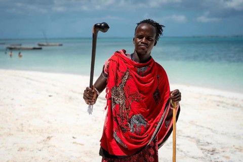 MICHAMVI KAE, ZANZIBAR - OCTOBER 14, 2025: Masai with a Rungu stick, a traditional Masai weapon