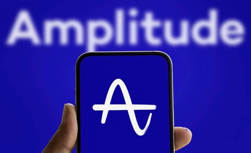 Amplitude logo is displayed on smartphone. Amplitude, Inc. is an American publicly trading company