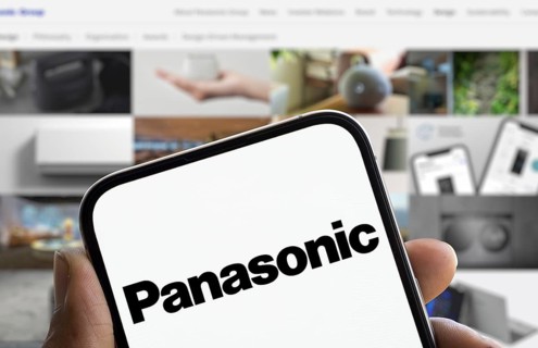 Panasonic logo is displayed on smartphone. Panasonic Holdings Corporation is a Japanese