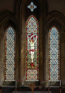 Stained glass east window depicting Crucifixion by Heaton, Butler and Bayne c 1870, Debenham