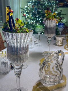 Christmas table decoration with various glasses and carafes