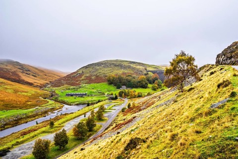 Autumn colors over Claerwen Dam, Claerwen Valley, Elan Valley Reservoir, Rhayader, Powys, Wales, UK