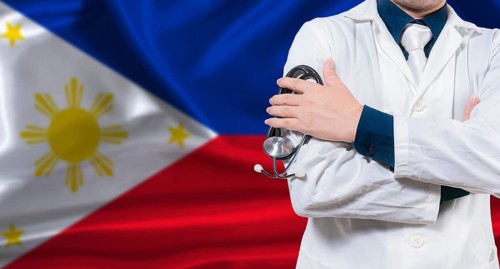 Philippine national health system, Medical professional holding sthetoscope isolated