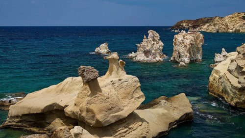 Dramatic rock formations on the edge of the deep blue ocean, Aspragremna, White Cliffs, Mavorspilia