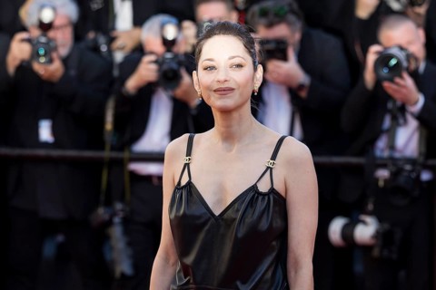 Marion Cotillard with Karma on the Red Carpet at the Palais des Festivals et des Congrès during the