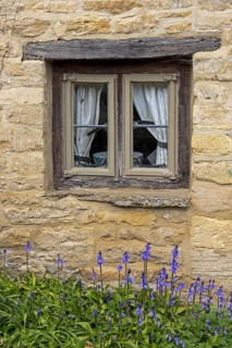 Window, flowers, house wall, Cotswold Stone, Bibury, The Cotswolds, England, Great Britain