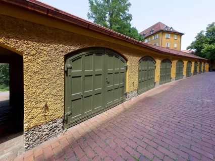 Yellow residential buildings, garages, borstei, heritage-protected residential development, Munich,