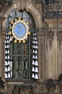 Clock with porcelain bells at the Zwinger in Dresden, Saxony