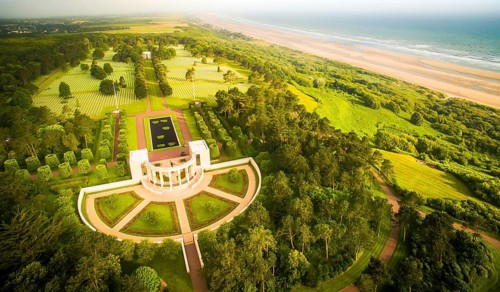Aerial view to dramatic normandy coast with memorial to dead american soldiers of WW2.Omaha