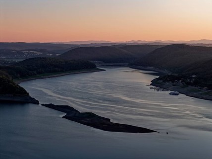 The Edersee, Eder Reservoir, at dusk at the Kellerwald-Edersee National Park in northern Hesse.