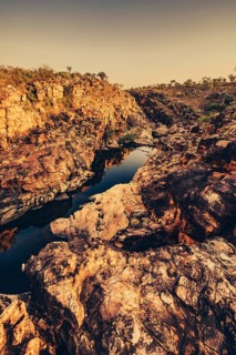 Bell Gorge waterfall, a body of water in north-west Australia in the Kimberley. Sunrise in the