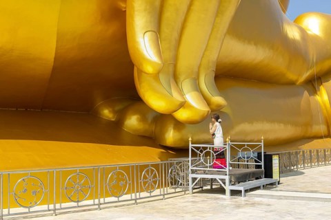 Largest Buddha statue in Thailand (Luang Pho Yai), Thai woman, Wai gesture (traditional gesture of