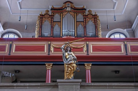 Sculpture of Justice in front of the organ gallery, St. Michael Collegiate Church, Neunkirchen am