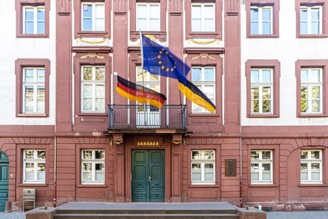Baden-Württemberg Management Academy in Karlsruhe. Exterior view with shield and national coat of