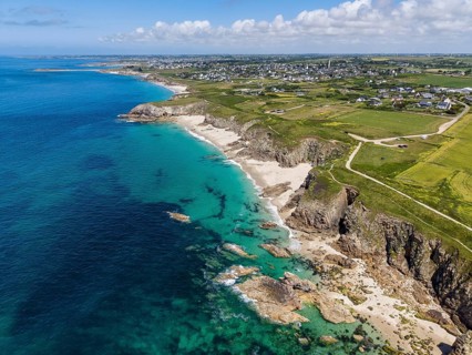 Aerial view of the sandy beach, Plage des Charettes beach north of Pointe Corsen, a cape at the