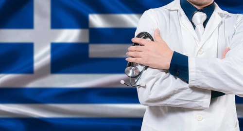 Greek national health system, Medical professional holding sthetoscope isolated