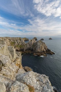 Rocky coast of Camaret-sur-Mer in the Finistère department in northwestern France, with a partly