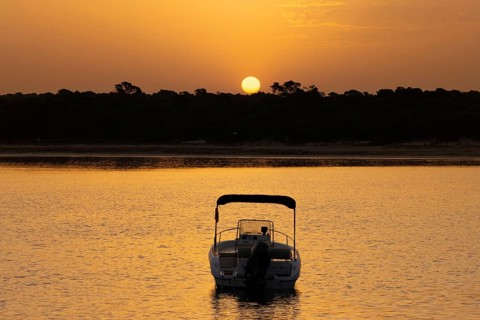 The sun rises on the Spanish Balearic island of Majorca, Colonia de Sant Jordi, Majorca, Spain