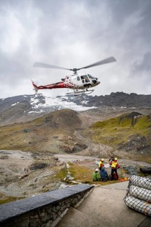 Air rescue operations in the mountains, rescue helicopter, Valais, Switzerland