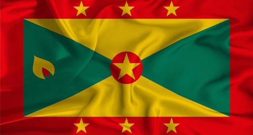 Realistic Grenada flag waving. Close up of flag of Grenada with cloth texture
